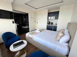 Posteľ alebo postele v izbe v ubytovaní La Suite Luxe : Vue Mer - Malo'cation