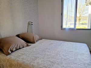 Postel nebo postele na pokoji v ubytování Gite de La Forge