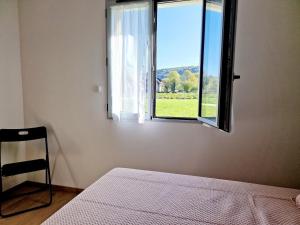 Postel nebo postele na pokoji v ubytování Gite de La Forge