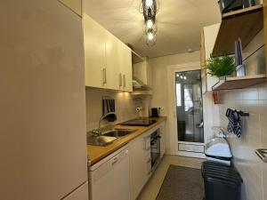 A kitchen or kitchenette at La Torre Golf Resort