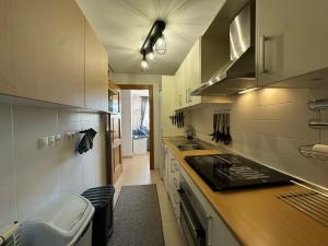 A kitchen or kitchenette at La Torre Golf Resort