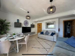 A television and/or entertainment centre at La Torre Golf Resort