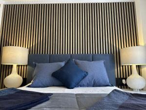 A bed or beds in a room at La Torre Golf Resort