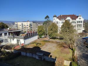 an aerial view of a yard in a city with buildings at Elegant, Suite, Swimming Pool in Wiesbaden