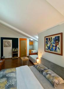 a hotel room with a bed and a bedroom at Markovic Aparthotel - Budva Becici Hotel in Becici