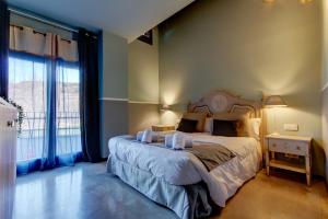 Katil atau katil-katil dalam bilik di Hotel de Riu Boutique