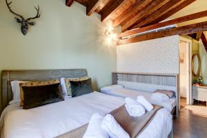 Katil atau katil-katil dalam bilik di Hotel de Riu Boutique