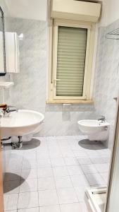 Koupelna v ubytování Hotel Ariella