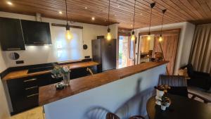 a kitchen with a counter top in a room at Cottage Aegean Holiday Villa in Bayırköy