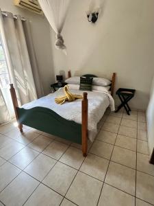 Ένα ή περισσότερα κρεβάτια σε δωμάτιο στο Hello Kruger Hideaway