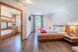 Katil atau katil-katil dalam bilik di Hotel Winterer