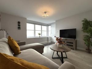 TV a/nebo společenská místnost v ubytování Pebbles - Lyme Regis