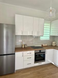 Kuchyň nebo kuchyňský kout v ubytování Tirana Residence + 16 fotografií