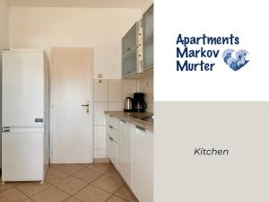 Kuchyň nebo kuchyňský kout v ubytování Apartments Markov Murter