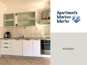 Kuchyň nebo kuchyňský kout v ubytování Apartments Markov Murter