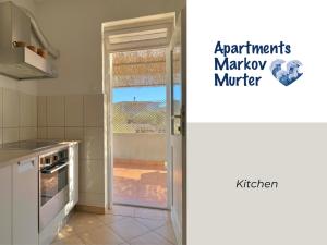 Kuchyň nebo kuchyňský kout v ubytování Apartments Markov Murter