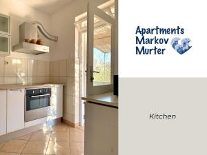 Kuchyň nebo kuchyňský kout v ubytování Apartments Markov Murter