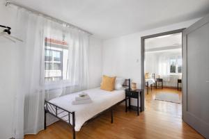 Ένα ή περισσότερα κρεβάτια σε δωμάτιο στο Mb Homes Nürtingen Fewo2