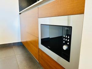 Kuchyň nebo kuchyňský kout v ubytování FC Home Suite
