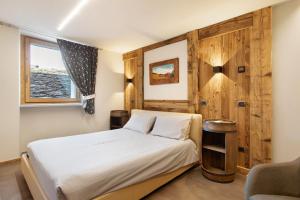 Postel nebo postele na pokoji v ubytování Alpine A-S