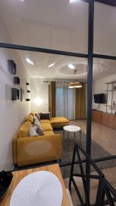 Posezení v ubytování Ambasador 3 Apartament