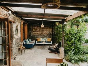 O zonă de relaxare la Cottage at Die Waenhuis +5 fotografii
