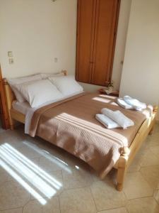 Postel nebo postele na pokoji v ubytování Antoni's Symi Home