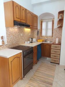 Kuchyň nebo kuchyňský kout v ubytování Antoni's Symi Home