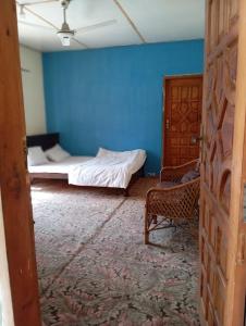 Postel nebo postele na pokoji v ubytování Stay in Skardu