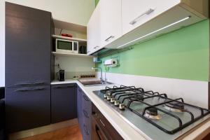 Kuchyň nebo kuchyňský kout v ubytování Green Torino - Free Parking, Close to City Center