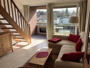 Χώρος καθιστικού στο Apartment Dangaster Oase , Danksteder Str 11