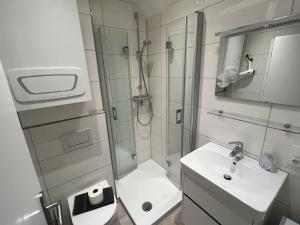 Ένα μπάνιο στο Apartment Dangaster Oase , Danksteder Str 11 +16 φωτογραφίες