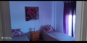 A bed or beds in a room at Apartamento en Las Marinas Vera