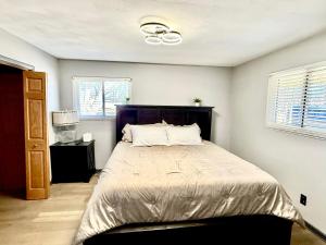 Katil atau katil-katil dalam bilik di Delightful 3 Bedroom Home