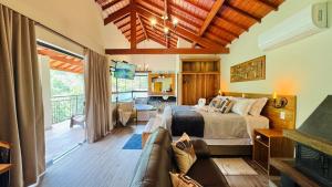 Postel nebo postele na pokoji v ubytování Villa Tirol - Monte Verde