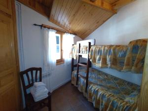 Posteľ alebo postele v izbe v ubytovaní Apartament L'àtic