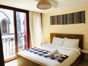 Postel nebo postele na pokoji v ubytování Hotel Brio Centro