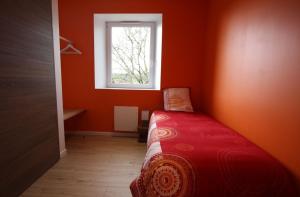 Postel nebo postele na pokoji v ubytování Gîte de La Madone