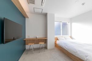TV a/nebo společenská místnost v ubytování &AND HOSTEL AKIHABARA