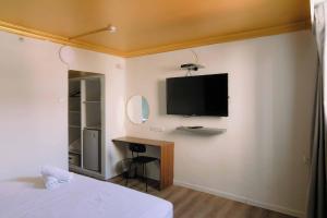 Sjónvarps- og/eða afþreyingartæki á Rich Boutique Hotel