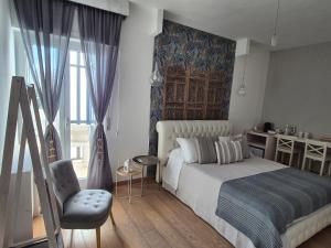 Postel nebo postele na pokoji v ubytování Le Dimore di Don Corrado