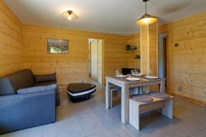 Posezení v ubytování Logement 3 étoiles avec vue imprenable sur les montagnes, ski bus
