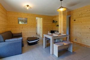 Posezení v ubytování Logement 3 étoiles avec vue imprenable sur les montagnes, ski bus