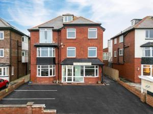 an empty parking lot in front of a brick building at The Wheeldale in Whitby