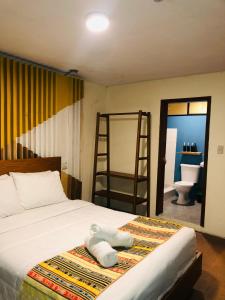 Postel nebo postele na pokoji v ubytování Hotel Brio Centro