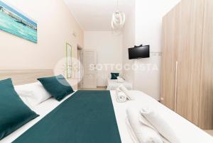 Телевизор и/или развлекательный центр в La Torre Apartments