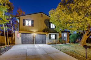 a house with a garage and a tree at Games Gone Wild Between Red Rocks And Downtown Denver In Arvada in Arvada