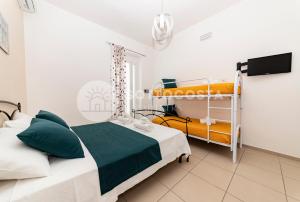 Кровать или кровати в номере La Torre Apartments