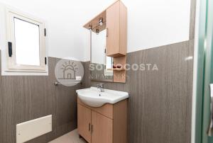 Ванная комната в La Torre Apartments +33 фотографии