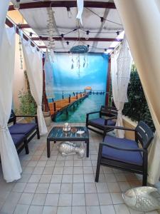 a patio with a view of the water at Silvi d'aMare in Silvi Marina